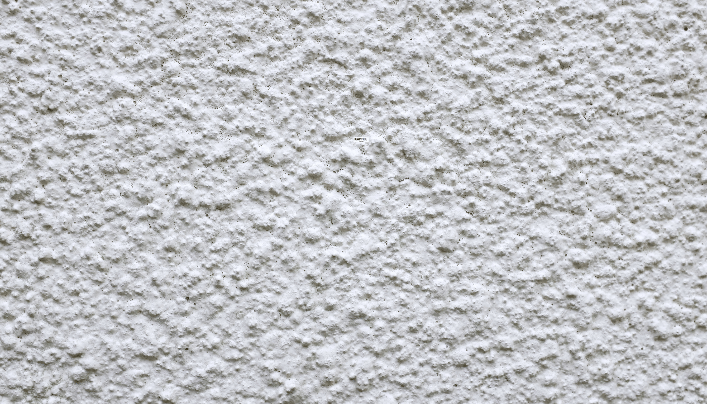 A close up of a white carpet texture.