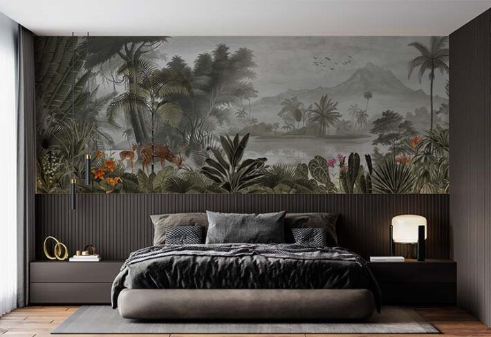 Bedroom with jungle mural headboard, dark bedding, and modern furnishings.