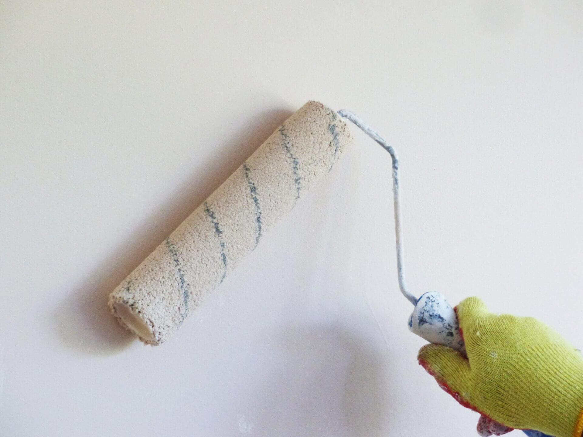 Rolling paint onto a wall