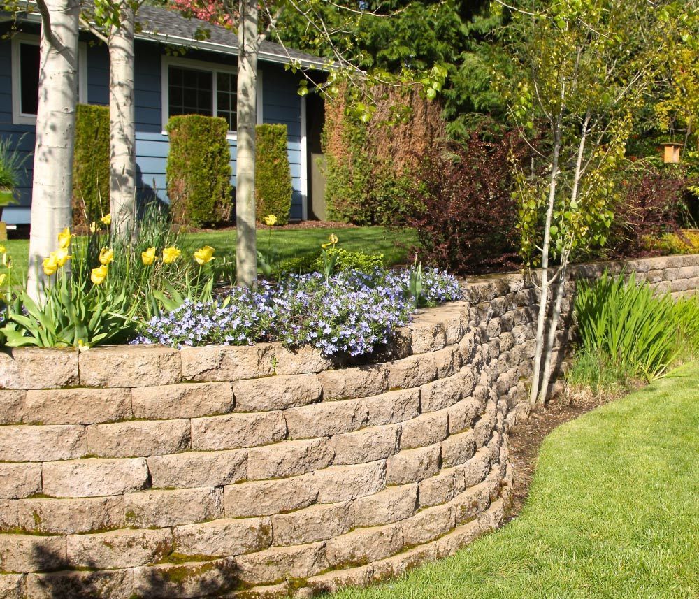 Retaining Wall in Landscaped Yard — Yonkers, NY — Jerry's Contracting Corp.