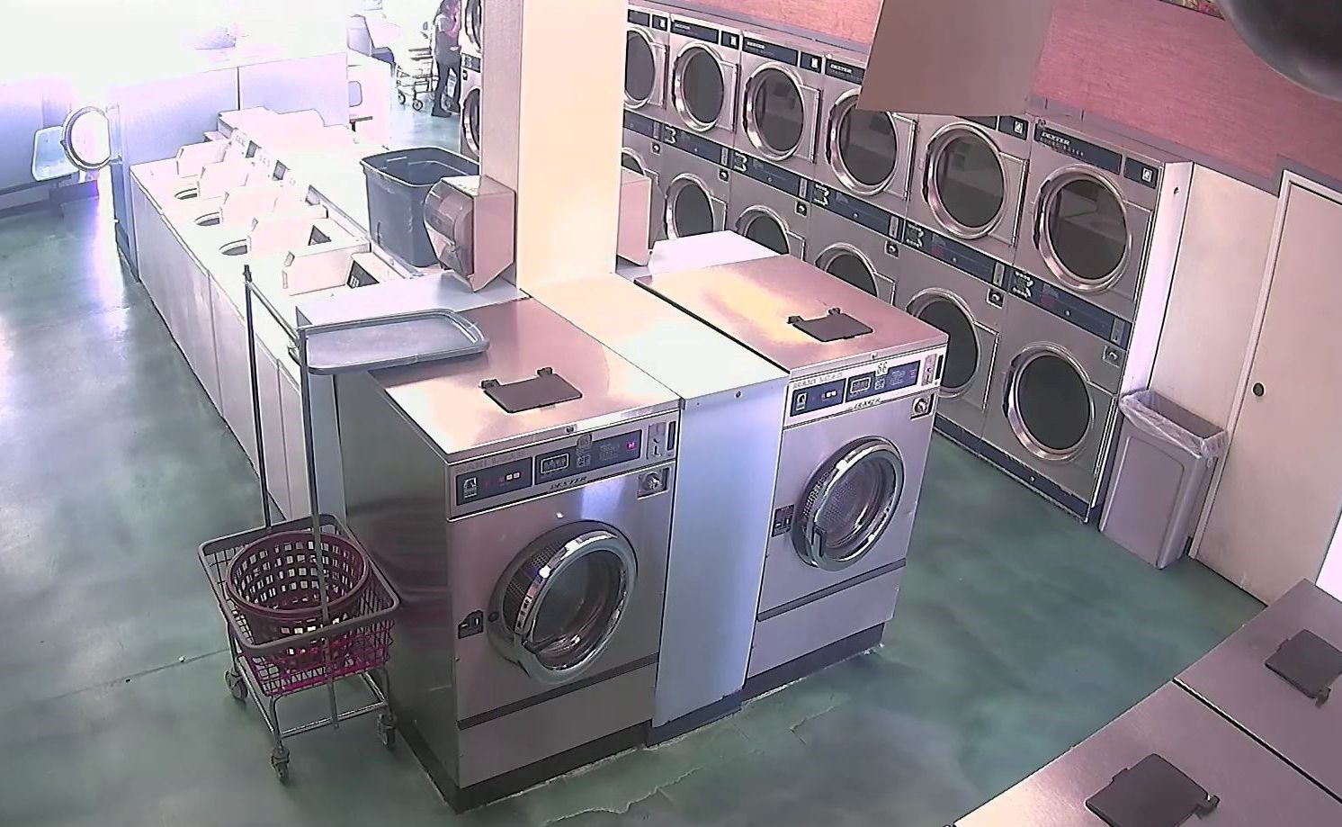 A row of washing machines with the number 5 on them