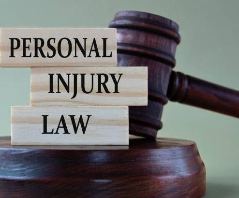 Wooden blocks stacked on top of each other that say personal injury law