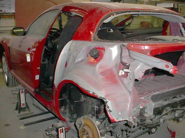 Manual Transmission — An image of a Red car at workshop in Louisville, KY