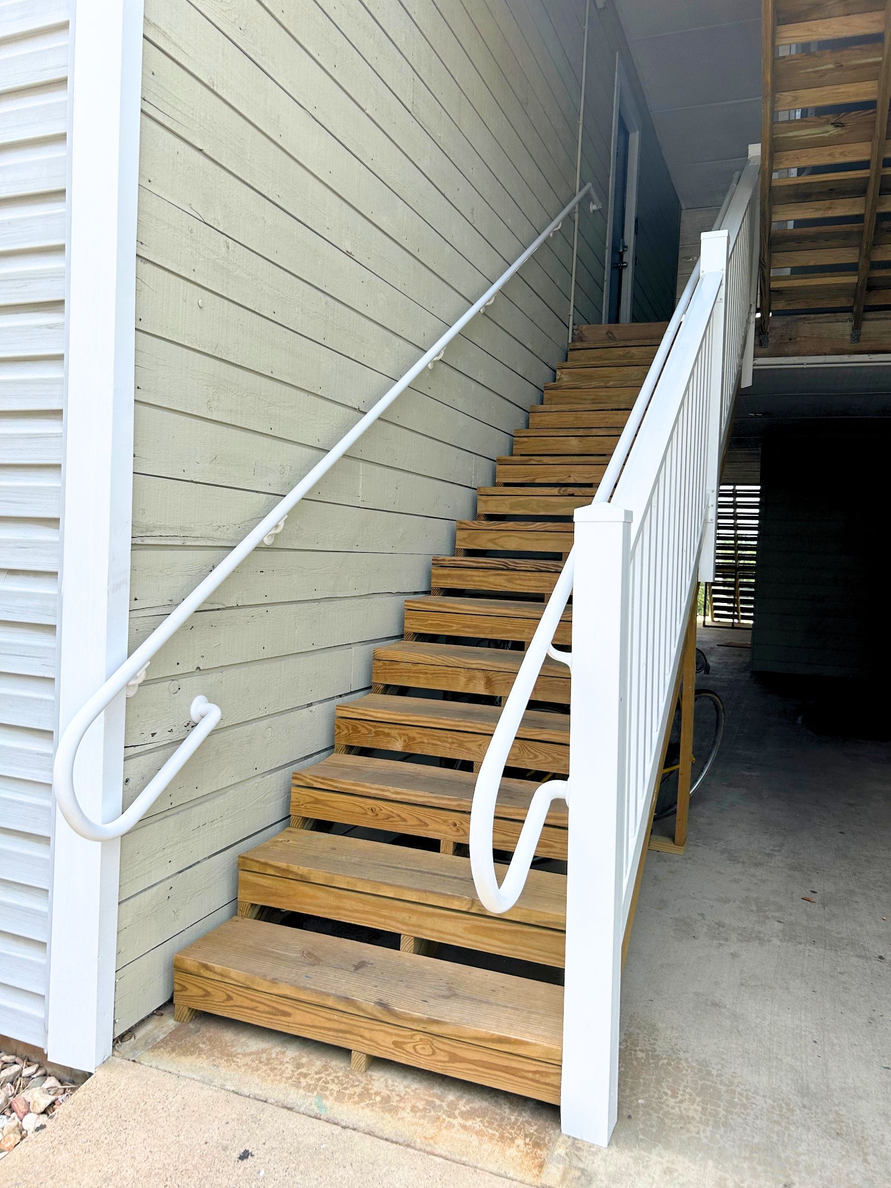 A brick wall with a handicap sign on it