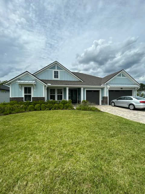 a house with a car parked in front of it