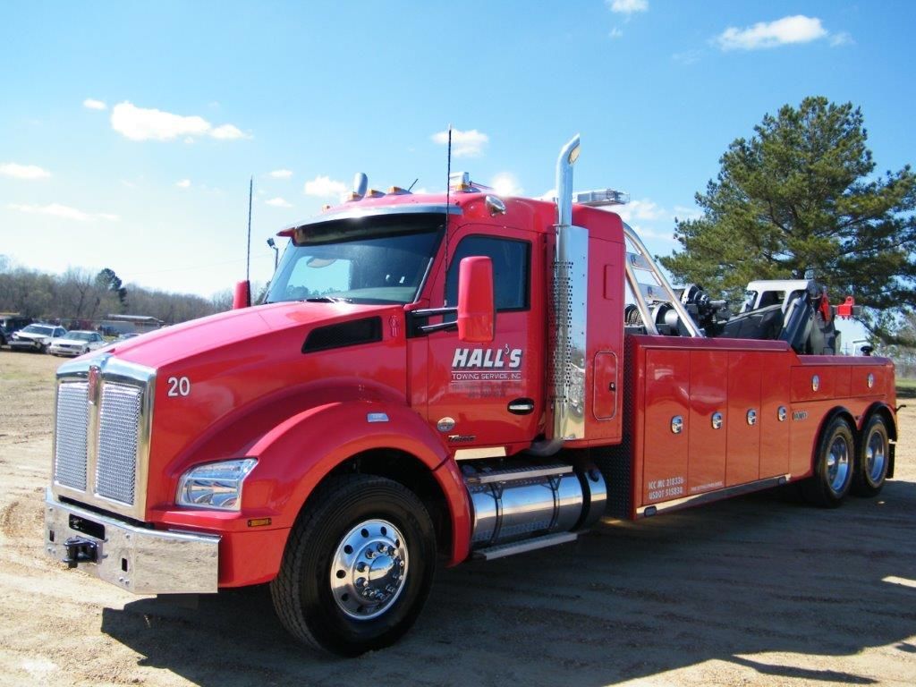 A Man Wearing a Tow Truck Vest — Pearl, MS — Hall’s Towing Service