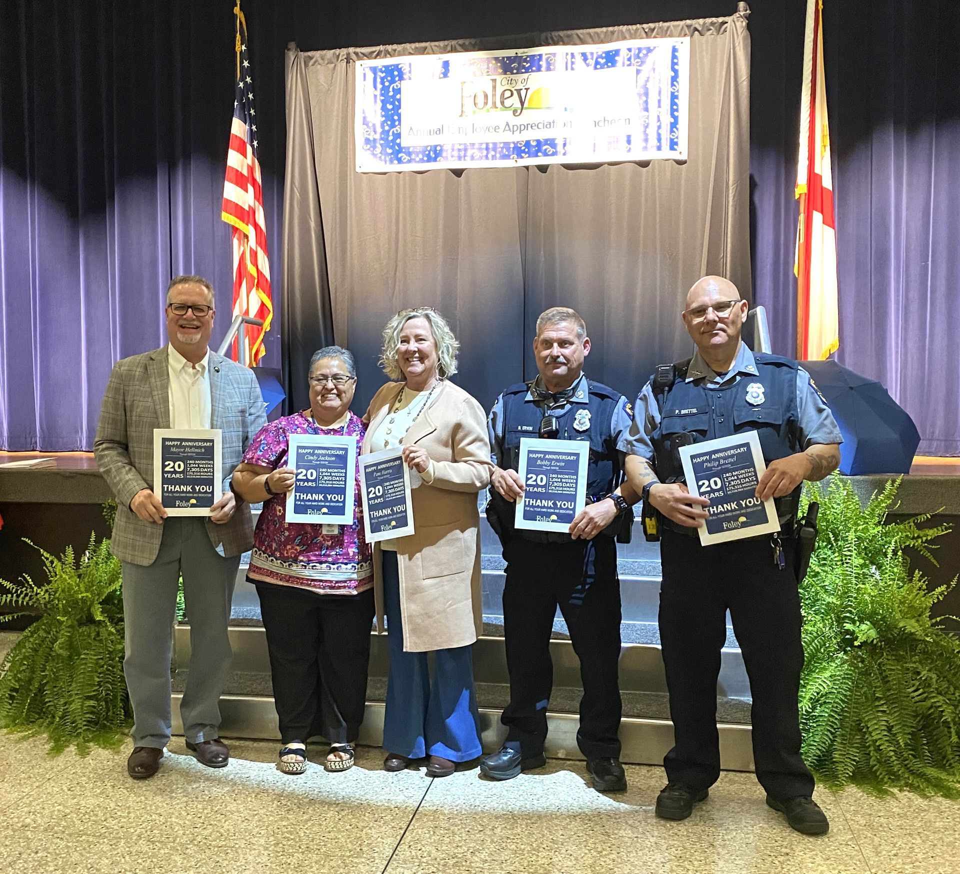 The city presented awards for 20 years of service to Philip Brettel, Bobby Erwin, Pam Harris, Ralph Hellmich and Cindy Jackson.