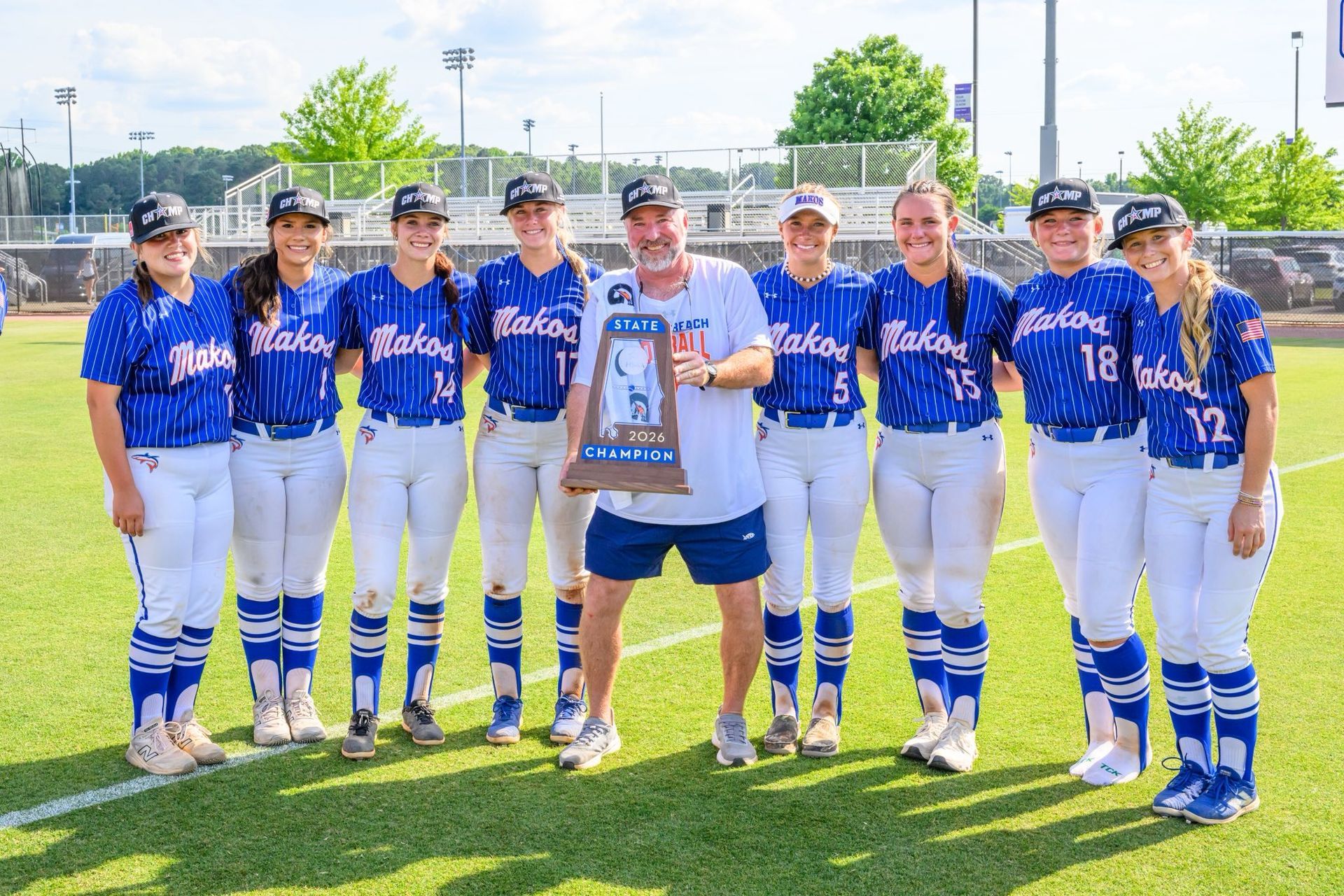 Coach Shane Alexander with the 2026 Lady Makos State Champions - Photo by Brent Alexander, Wolf Bay