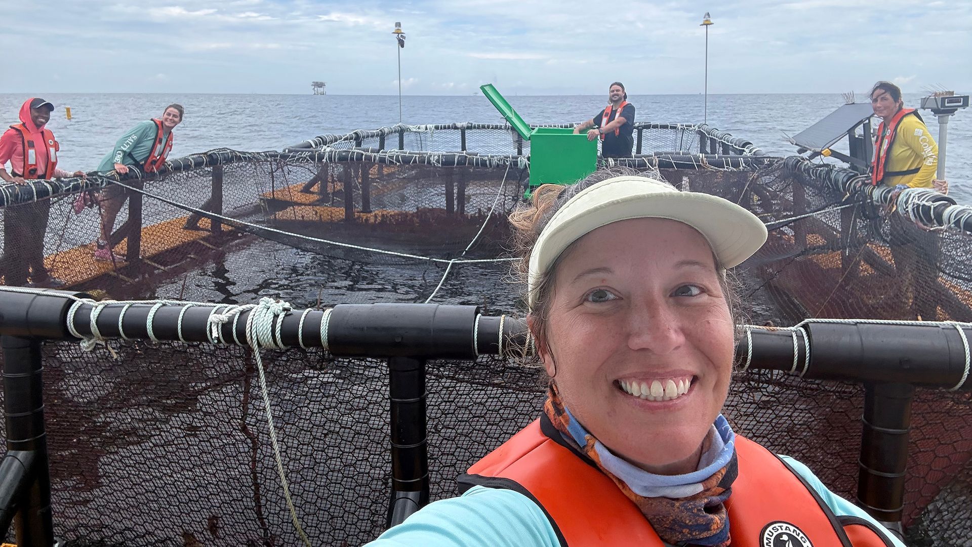 Ashley McDonald grabs a selfie as she and the team from Dauphin Island Sea Lab start to harvest.