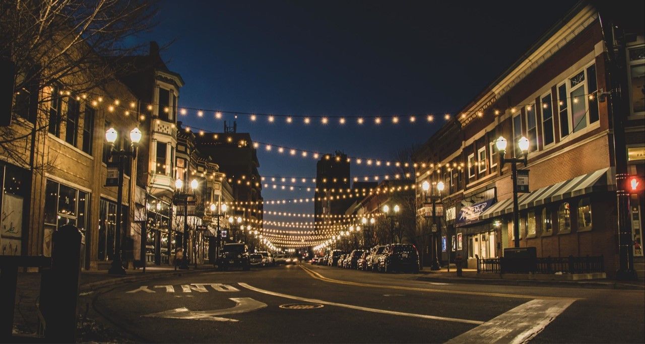 Cafe lights similar to these in another city, will be placed on West Jessamine Avenue near Hey 59