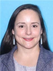 Emily A. Adams faces felony fraud charges after her arrest by Foley, Alabama, police.