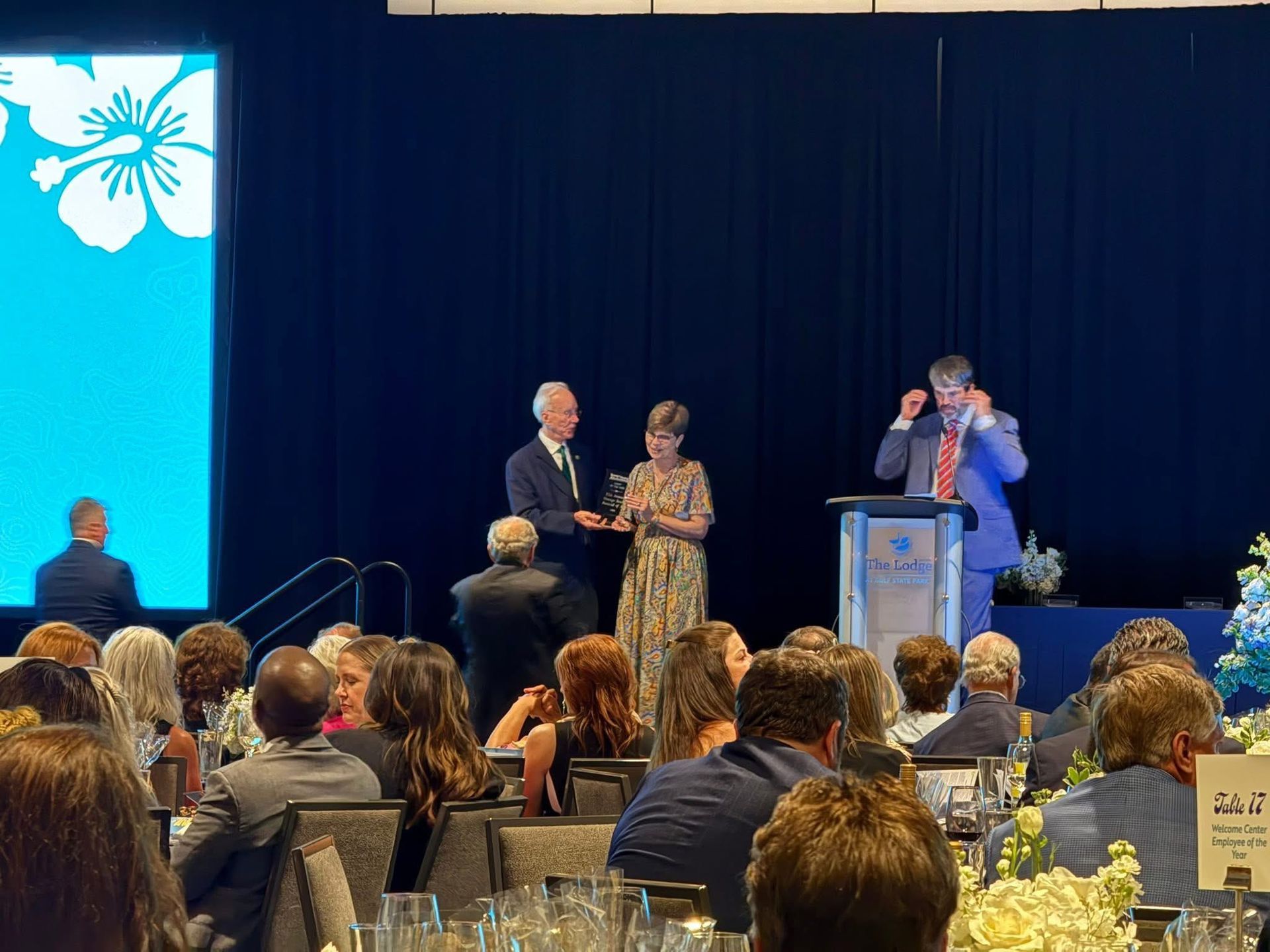 Desiree Hodge Receiving Award from Alabama Tourism Dept. Head, Lee Sentell.