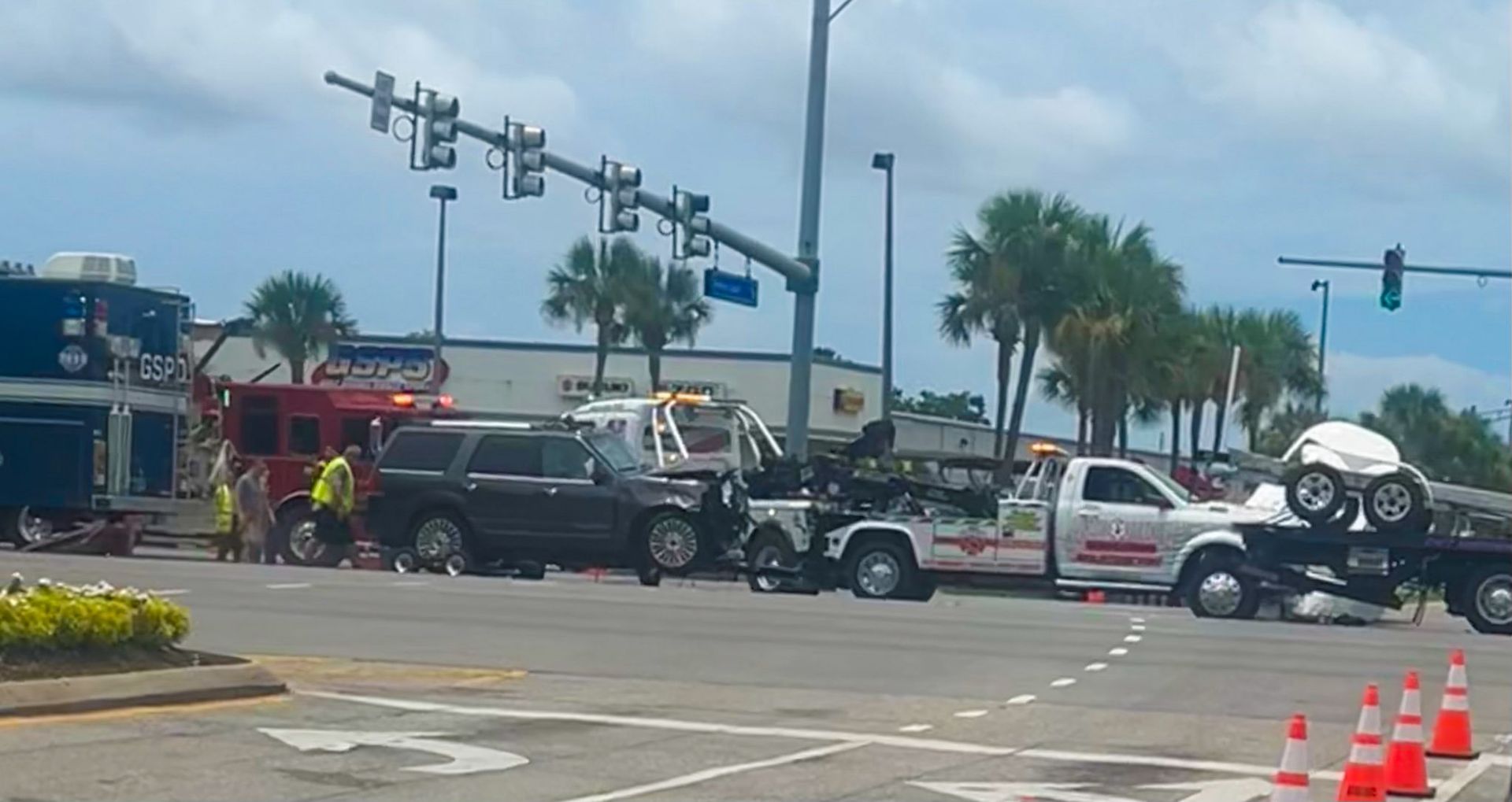 Wrecker removing SUV from the accident scene. 