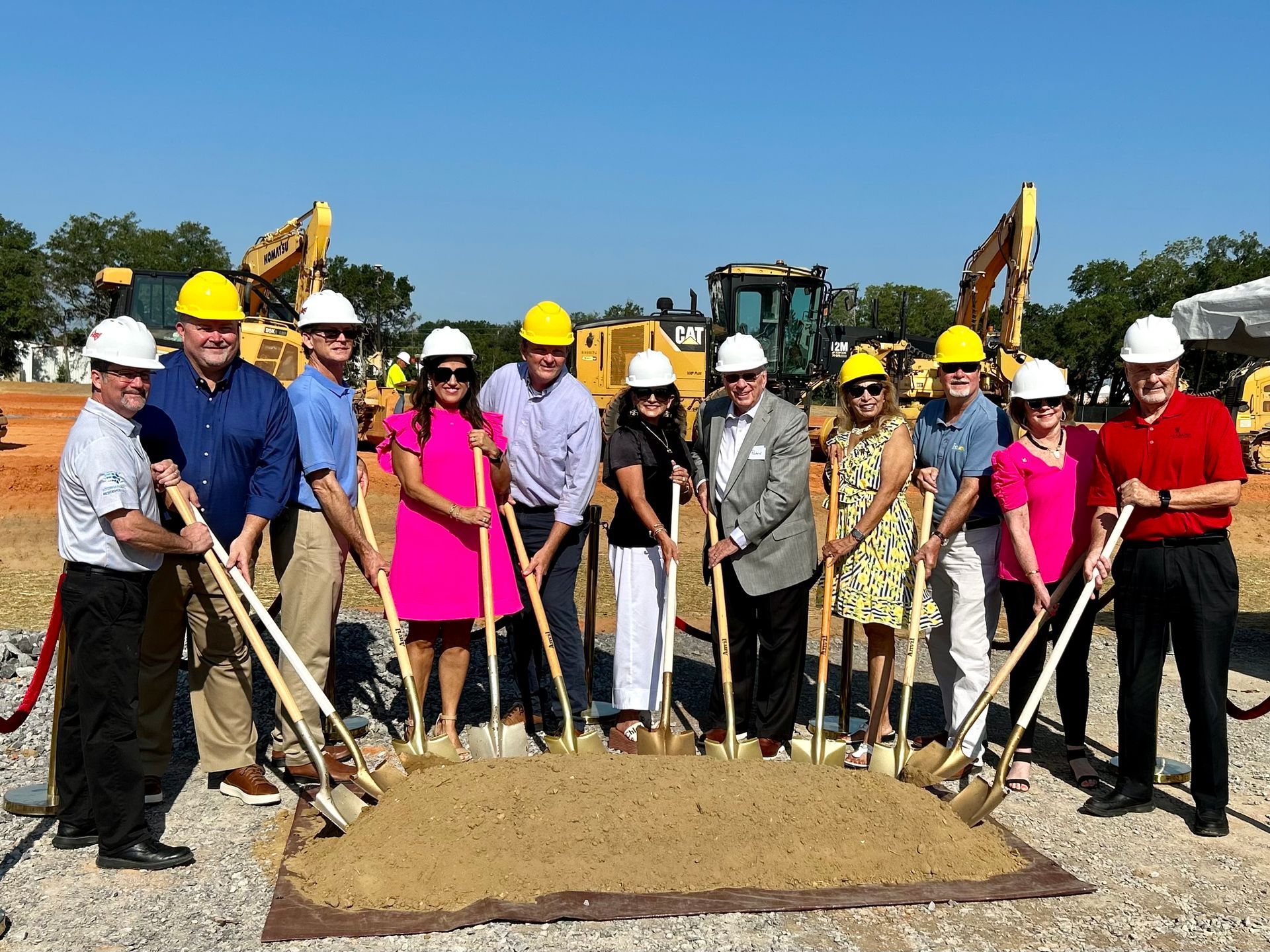 Area officials break ground for the International Residence Hall in Foley. The first phase of the project will include housing for more than 600 seasonal workers.