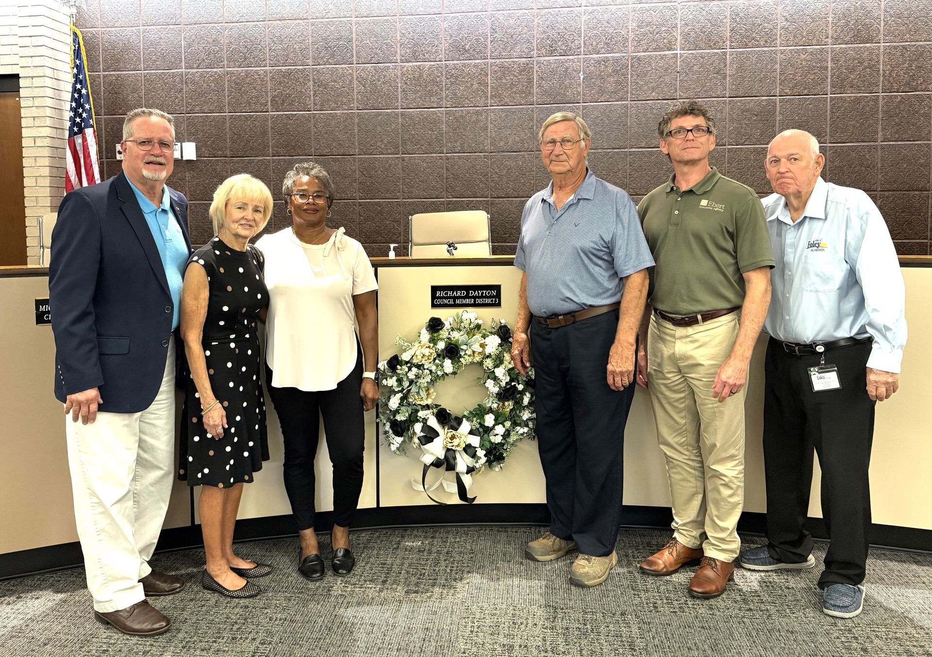 The Foley City Council and Mayor Ralph Hellmich presented a plaque and proclamation recognizing Councilman Richard Dayton, who died Aug. 21, to Dayton’s wife, Judy.