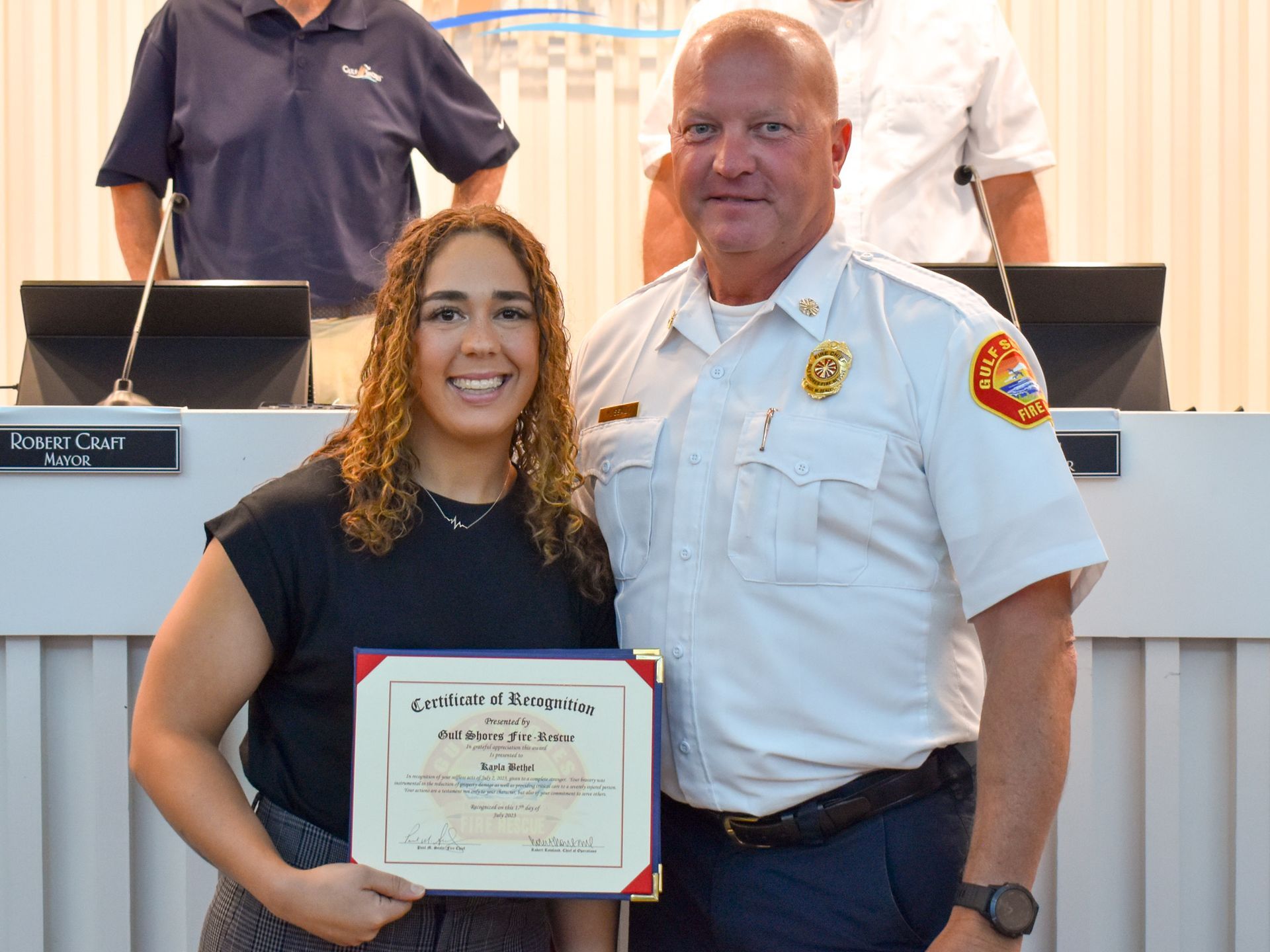 Kayla Bethel and Gulf Shores Fire Chief Mark Sealy