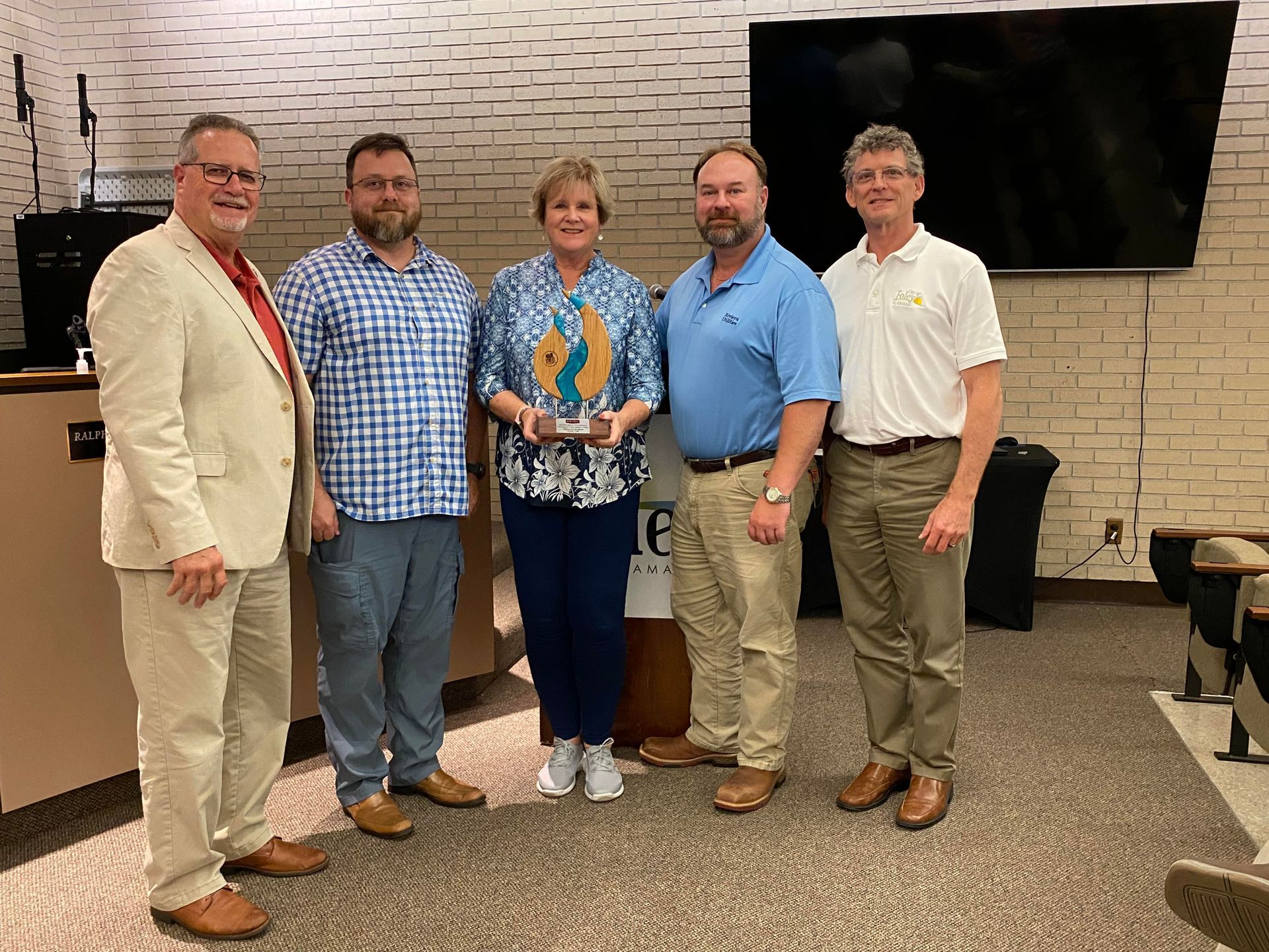 Foley Main Street presented the Main Street Alabama Award of Excellence to the Foley City Council. Foley Mayor Ralph Hellmich, left, and Councilman Charles Ebert III, right, accepted the award.