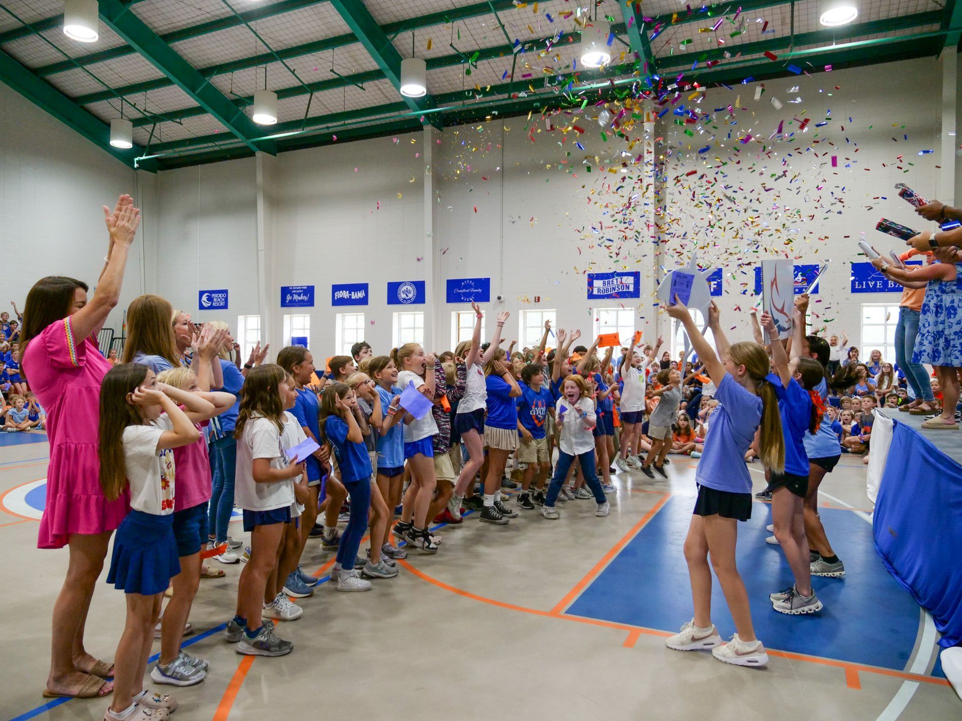 The third-grade class was celebrated for their accomplishment at an academic pep rally.