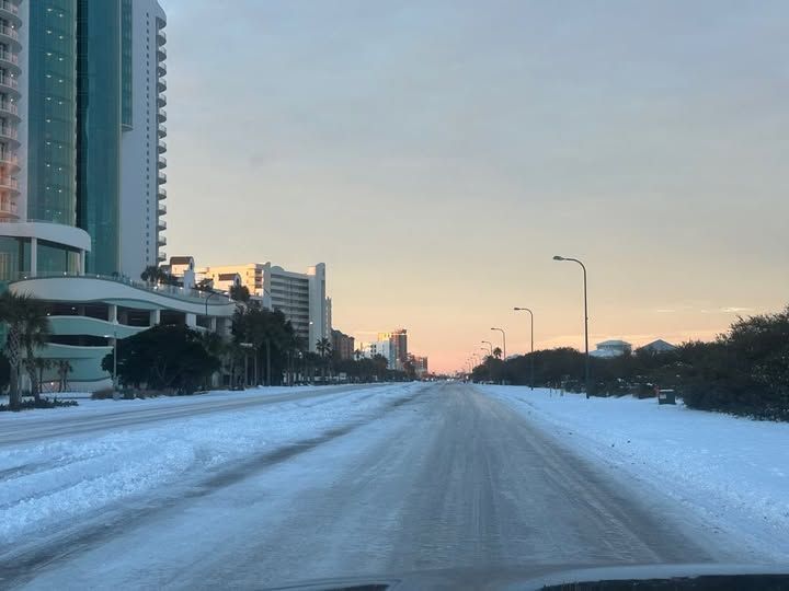 Ice patches on Perdido Beach Blvd, in front of Turquoise Place