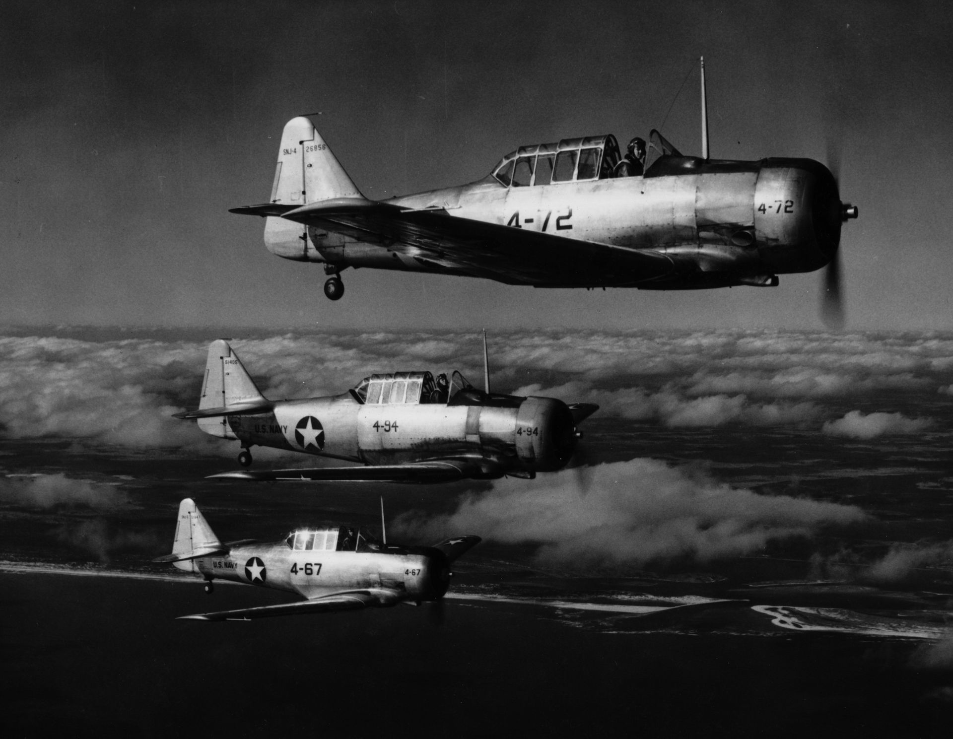 Navy training aircraft from Barin Field in Foley fly over the Gulf Coast in 1943. A museum exhibit on Barin Field opens Thursday, Dec. 5 at the Foley Railroad Museum.