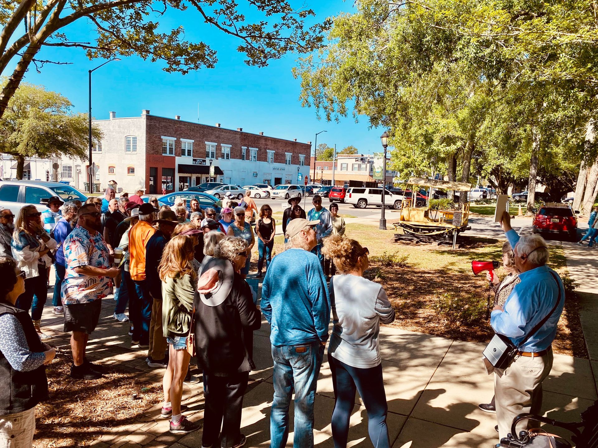 Walking tour participants take part in a history tour through downtown Foley. 