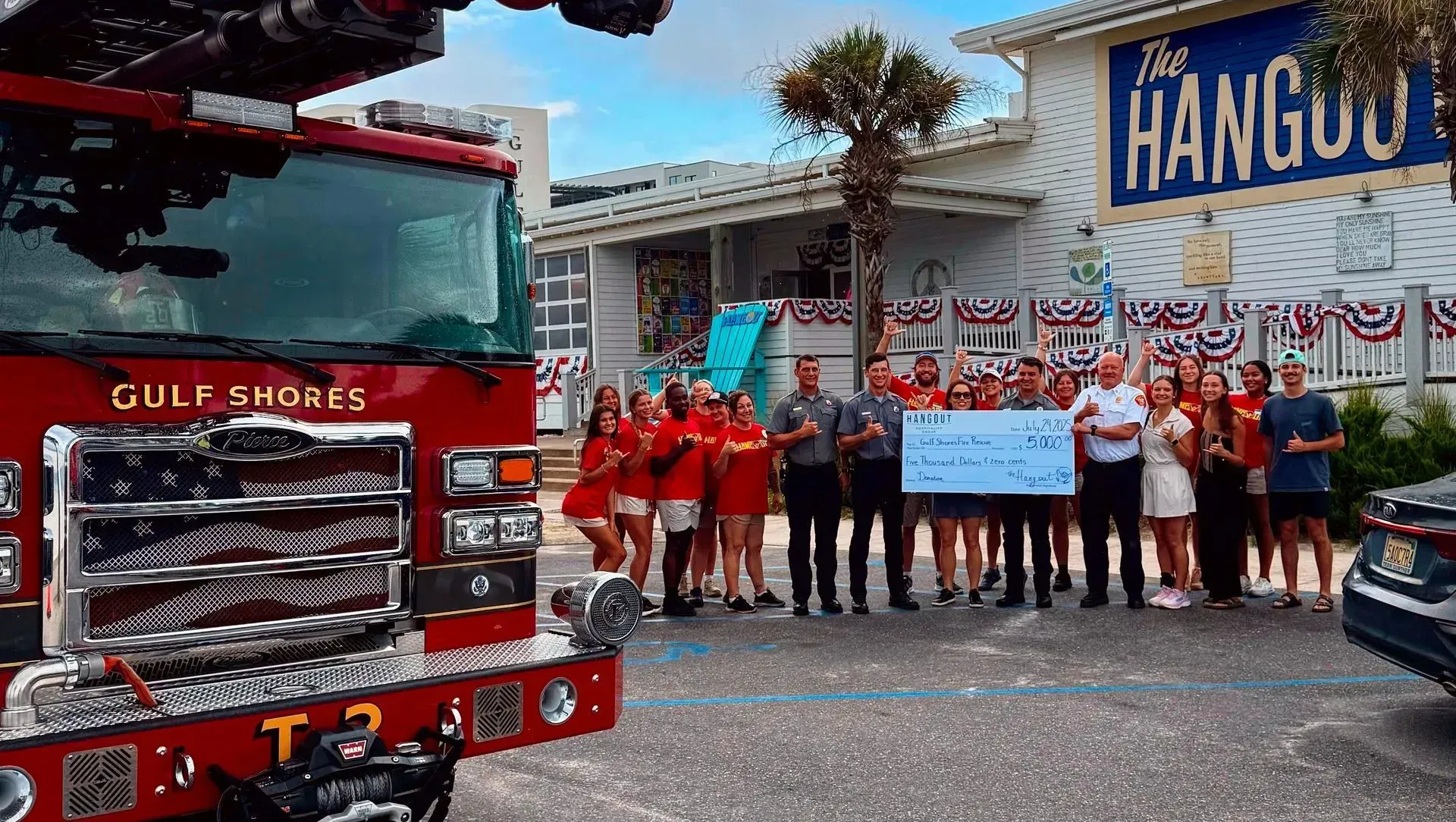 Gulf Shores Fire Rescue receives a check from The Hangout