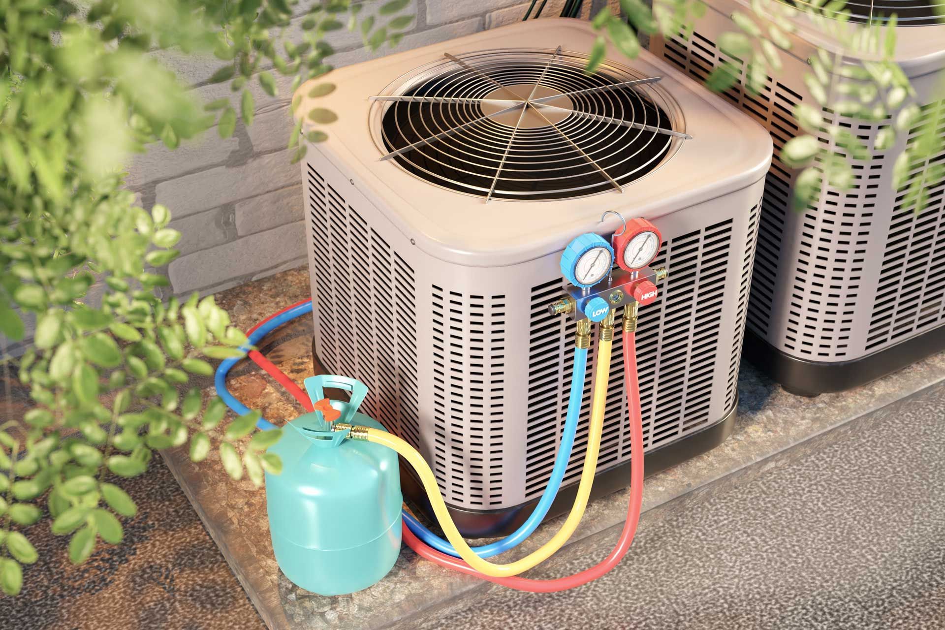 An air conditioning unit being serviced outdoors, hoses connected to gauges and a refrigerant tank.