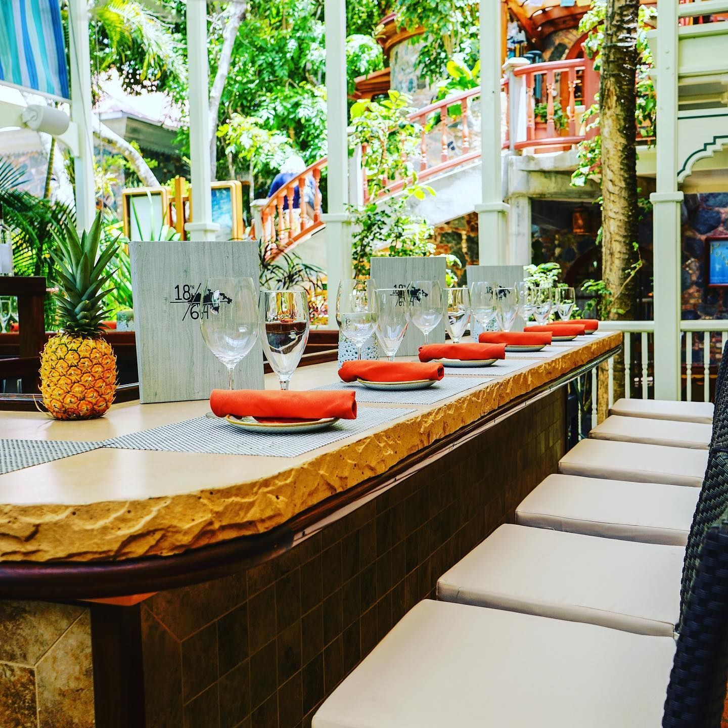 A long table with a pineapple on top of it