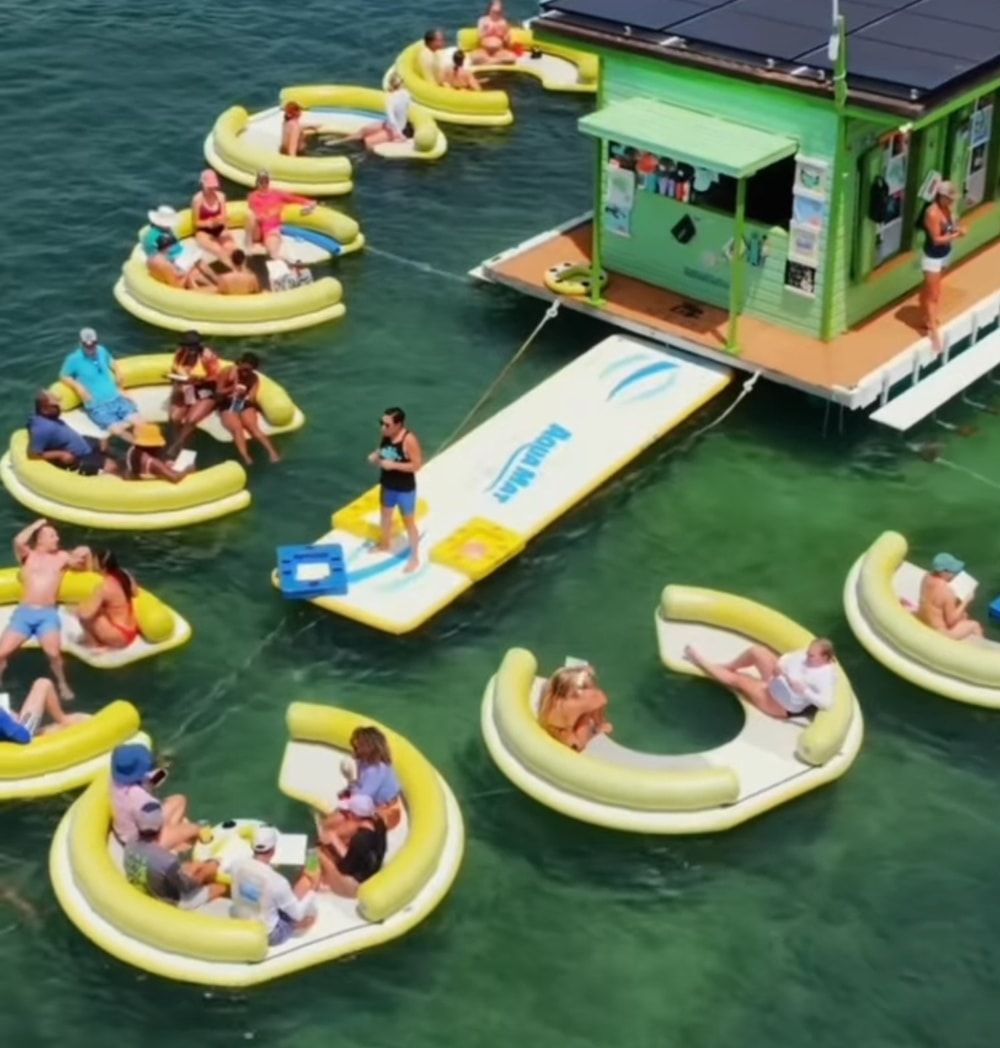 People sitting on inflatable boats