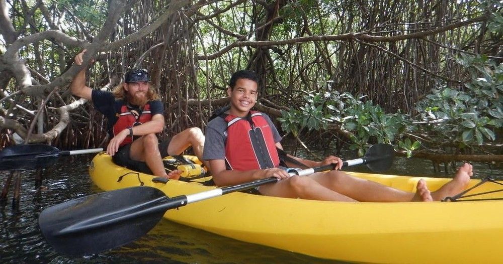 Two men doing kayak during the morning in Sal River