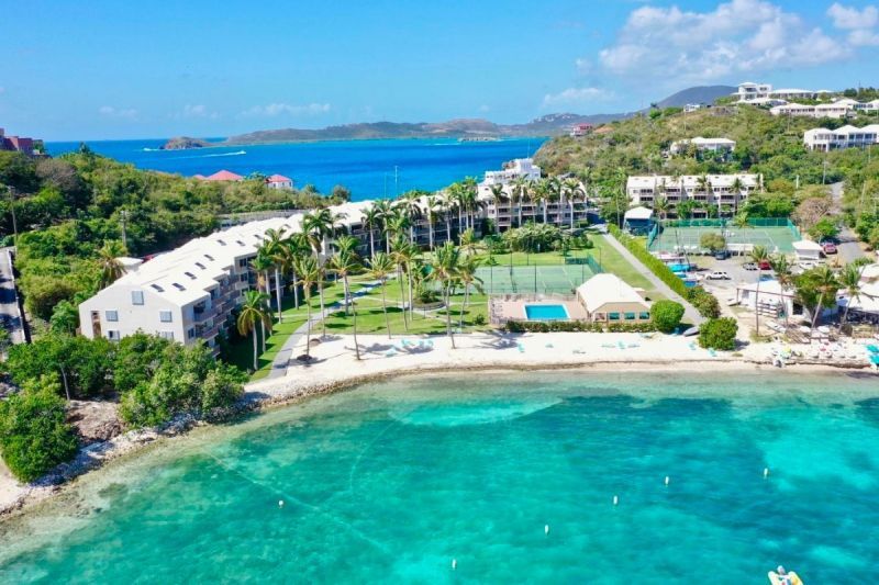 An aerial view of a resort on a tropical island