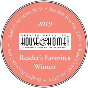 A badge that says ' reader 's favorites winner ' on it