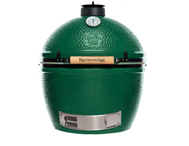 A green big green egg grill on a white background