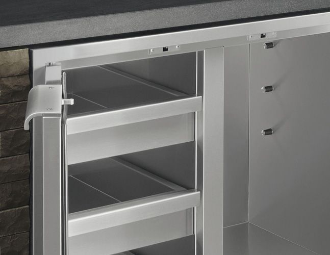 A stainless steel cabinet with three shelves and a door