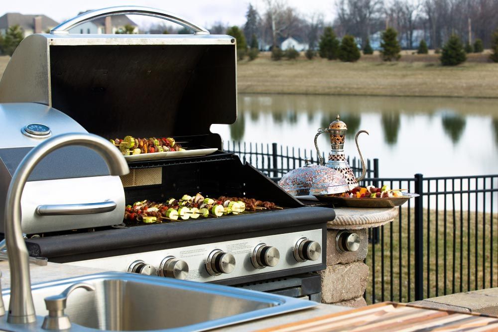 doing an outdoor grill near the lake
