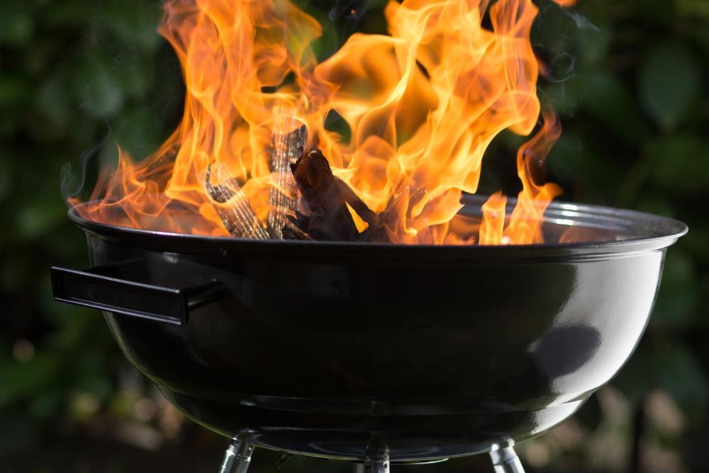 Ire Coming From The Burning Wood On The Grill In Nashville, TN