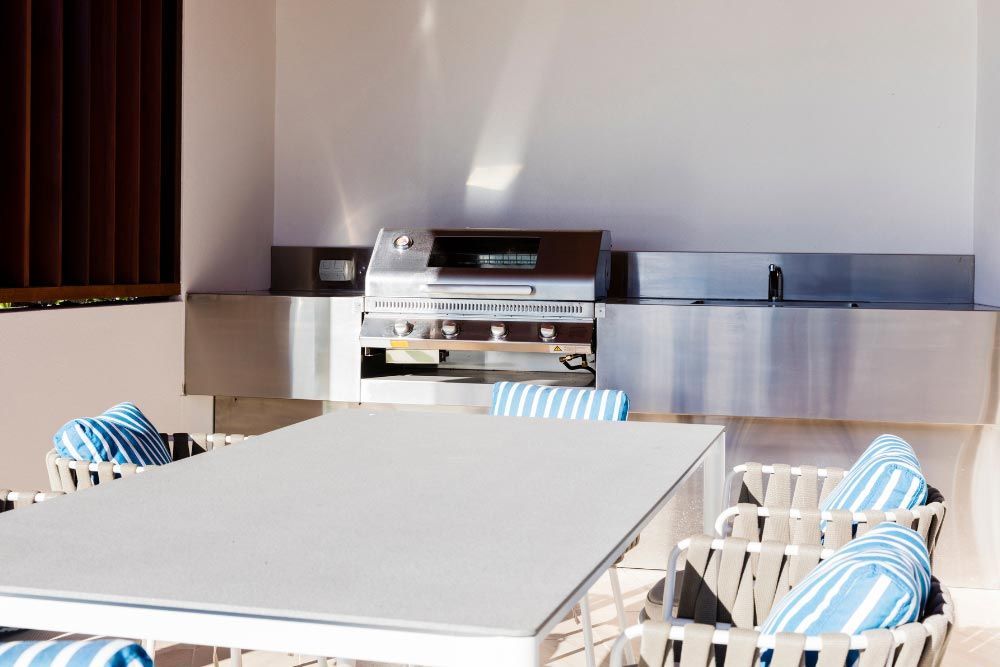 Table And Chairs With Outdoor Kitchen In Nashville, TN