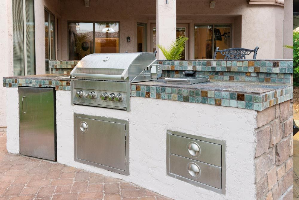 tiled outdoor kitchen and grill