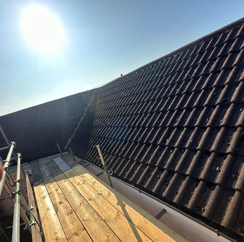 A picture of a pitched roof replacement carried out by Hightop Roofers Glasgow