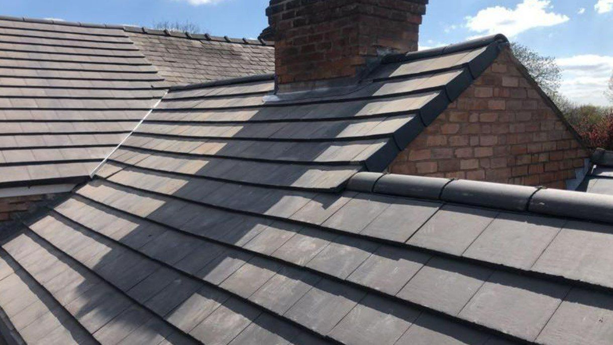 Picture of a new plain concrete tile roof by Roofers Glasgow