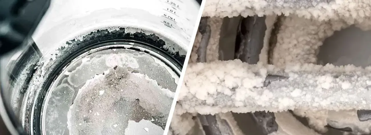Close-up of a household appliance heating element covered in heavy white mineral limescale deposits.