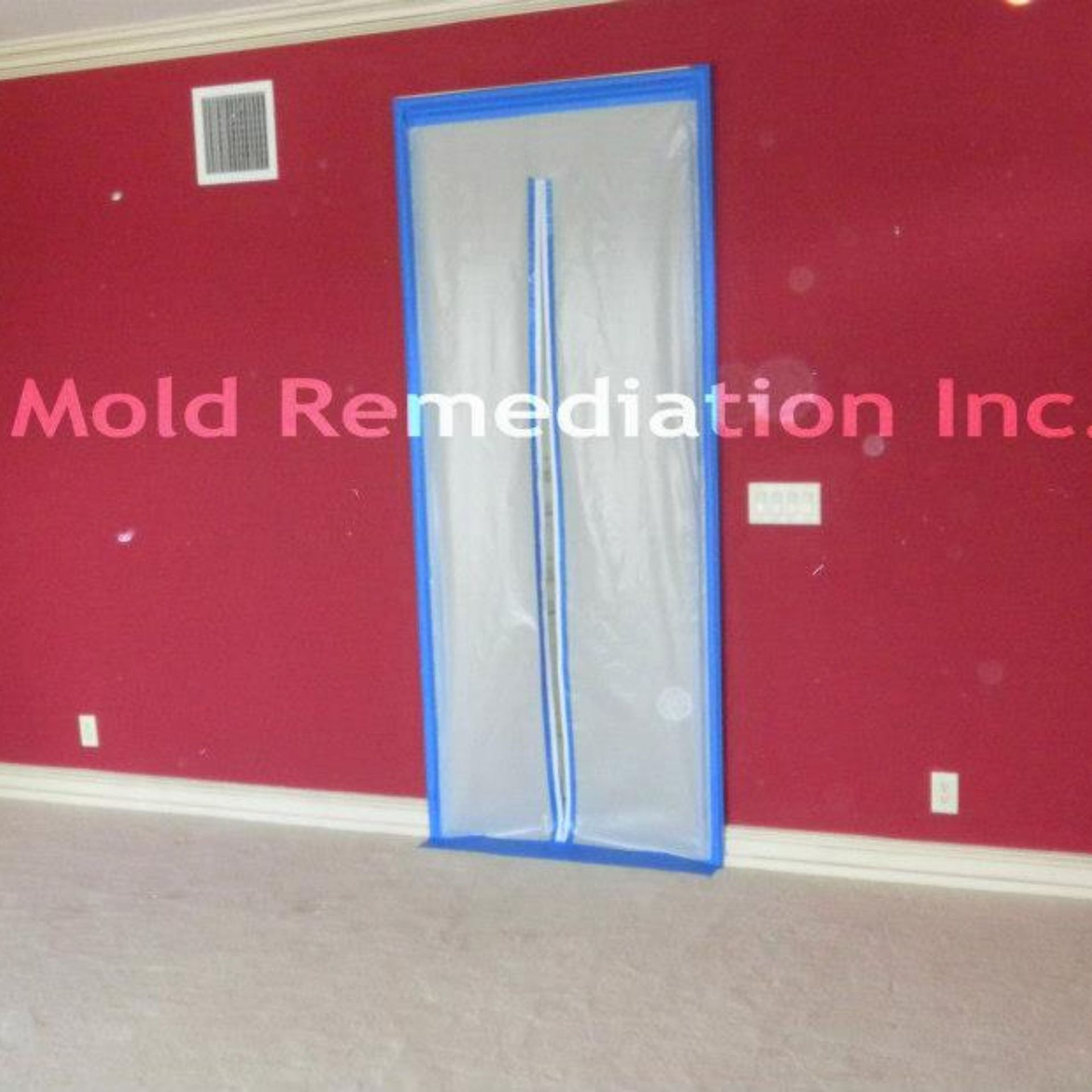 Mold Remediation Inc -A room with red walls and a door that says mold remediation inc.