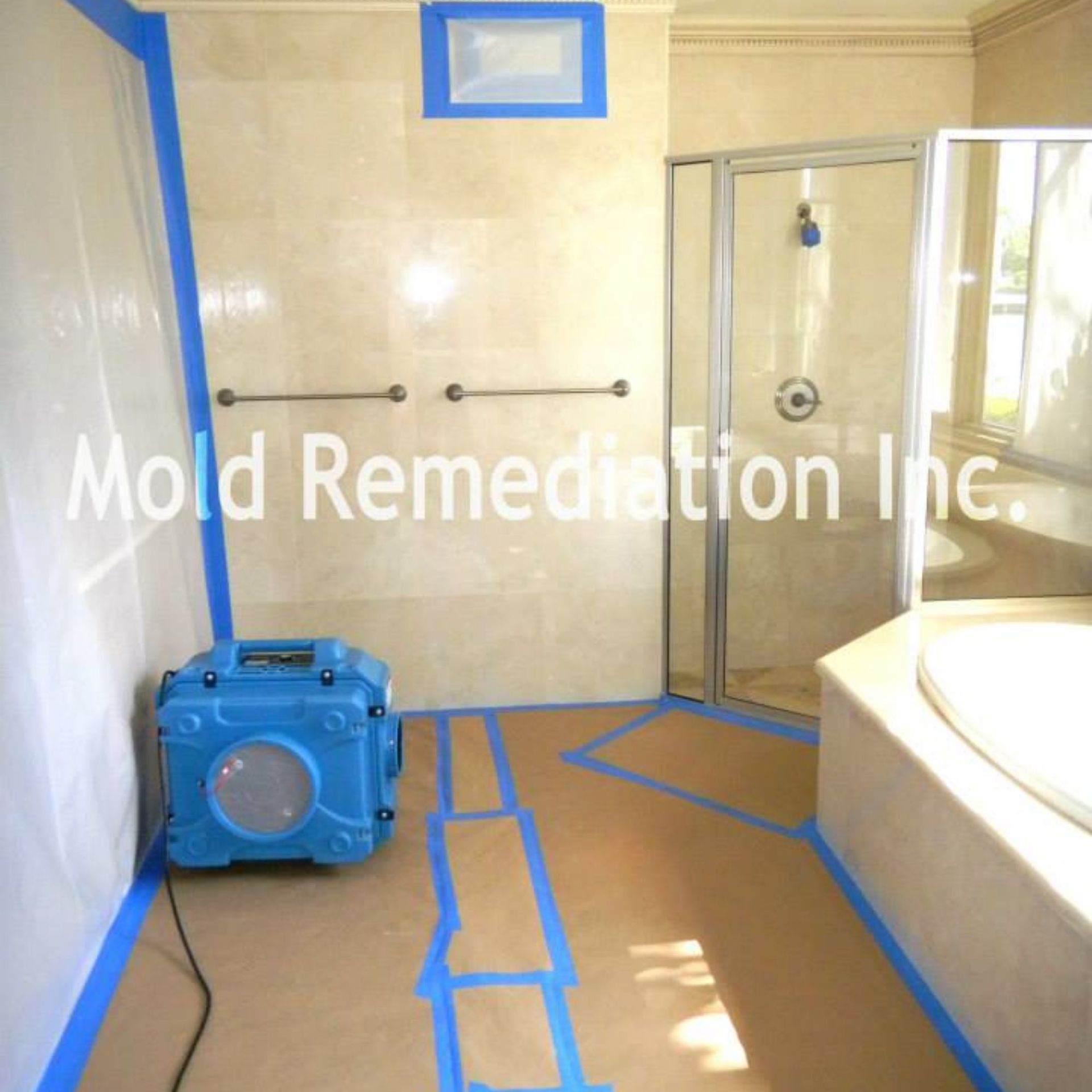 Mold Remediation Inc -A bathroom with mold remediation inc. written on the wall