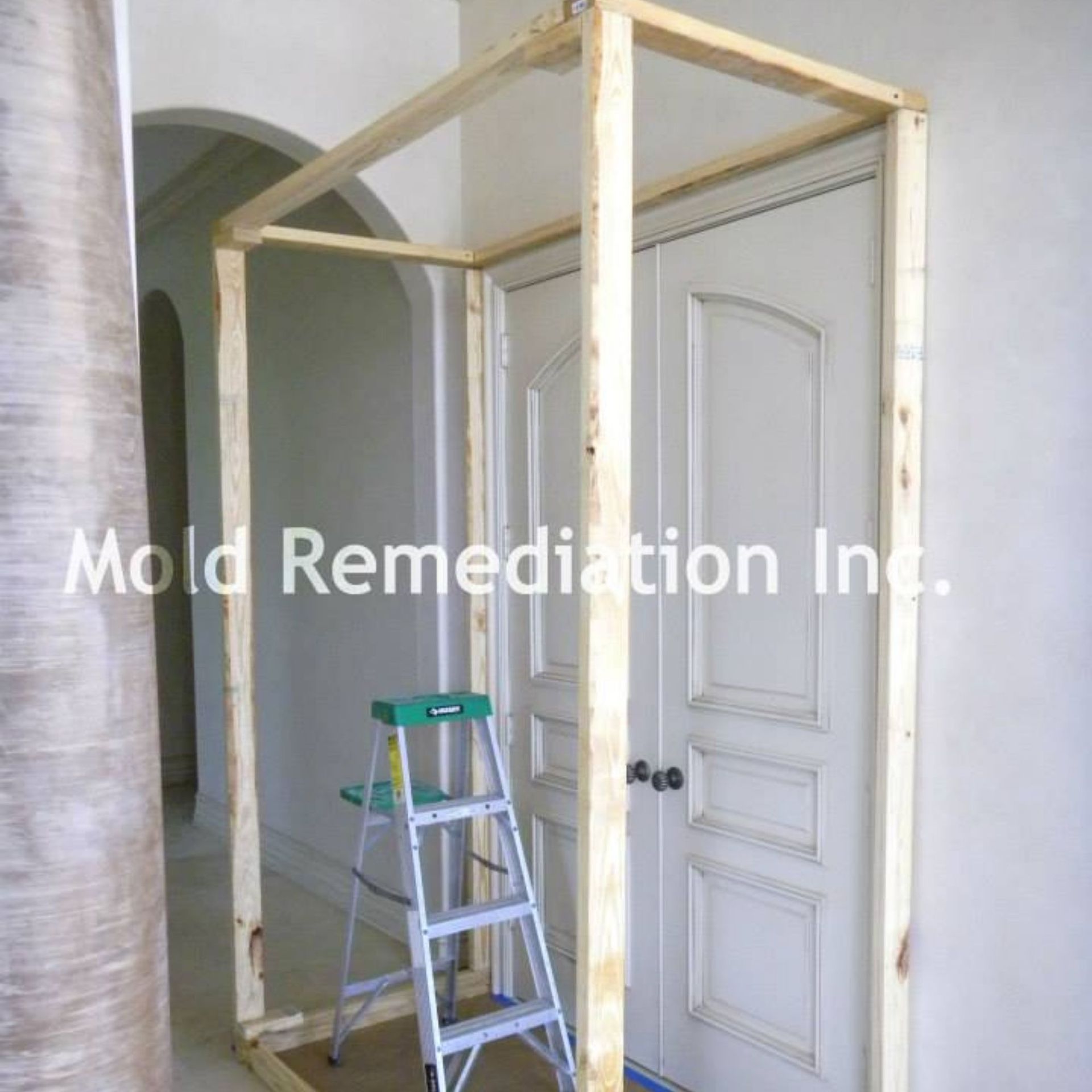 Mold Remediation Inc -A wooden frame with mold remediation inc. written on it