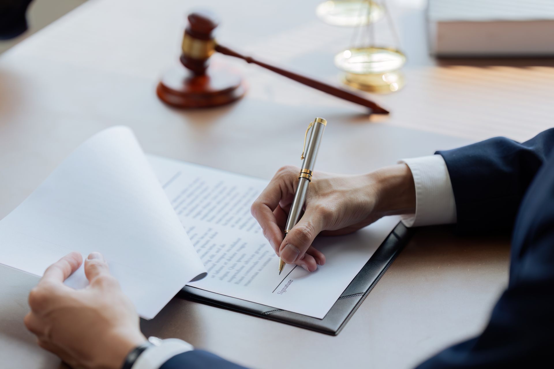 Probate law book with judge’s gavel on desk. Probate law book with judge’s gavel on desk.