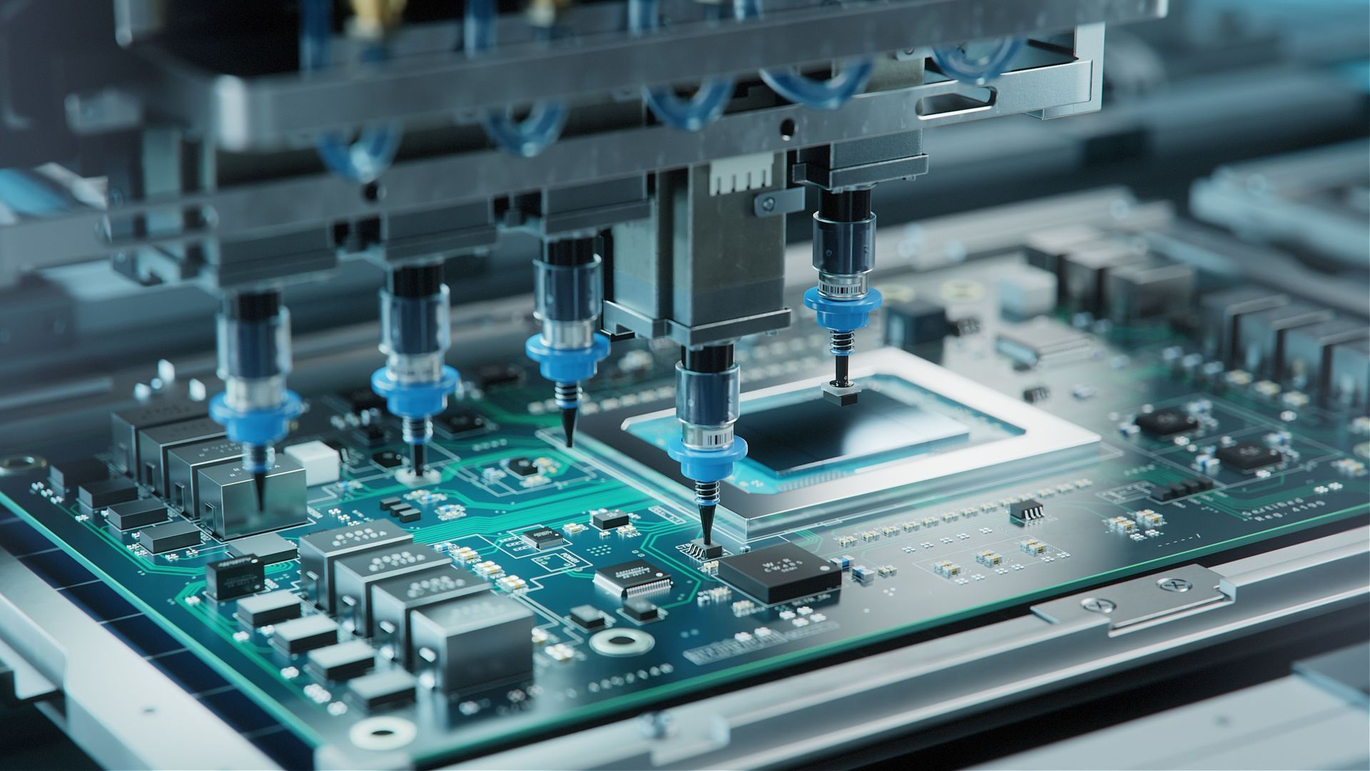 A person is pointing at a blue circuit board on a wall.