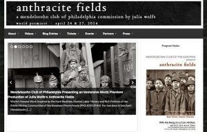 A black and white photo of a group of people standing next to each other on a website.