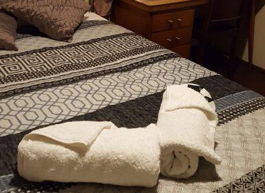 two towels over the bed
