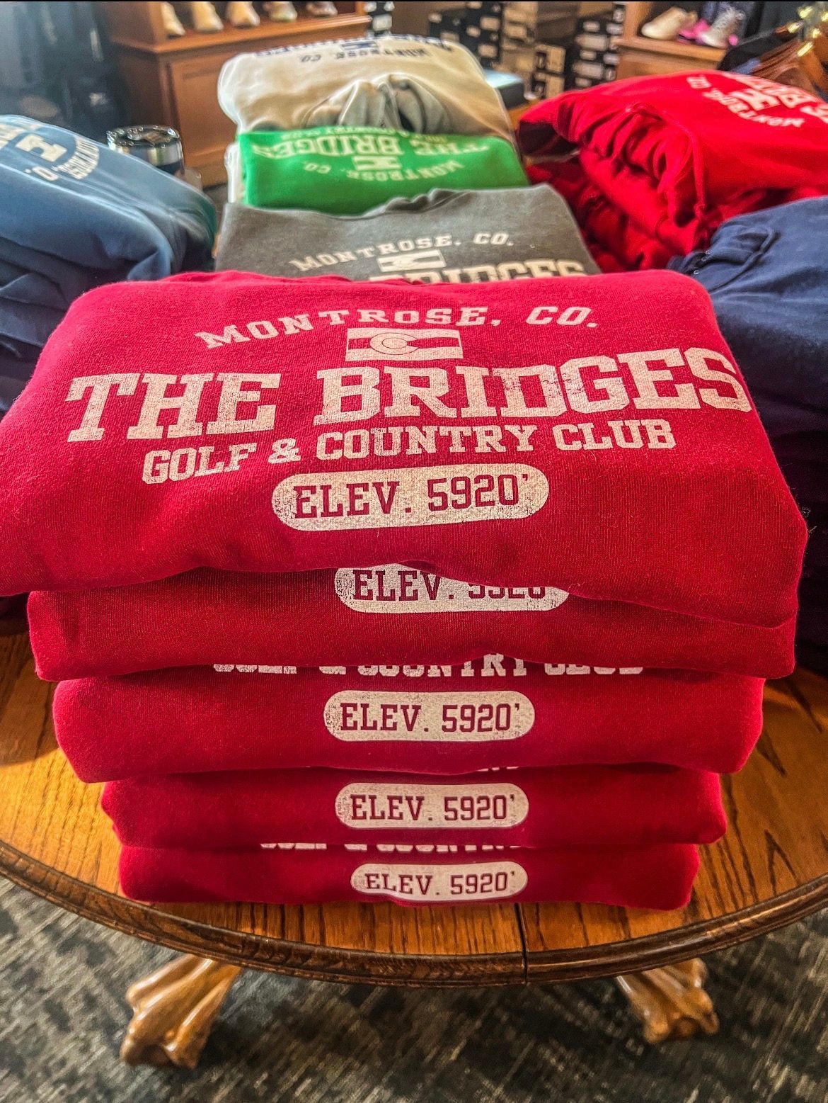 Stack of red sweatshirts with