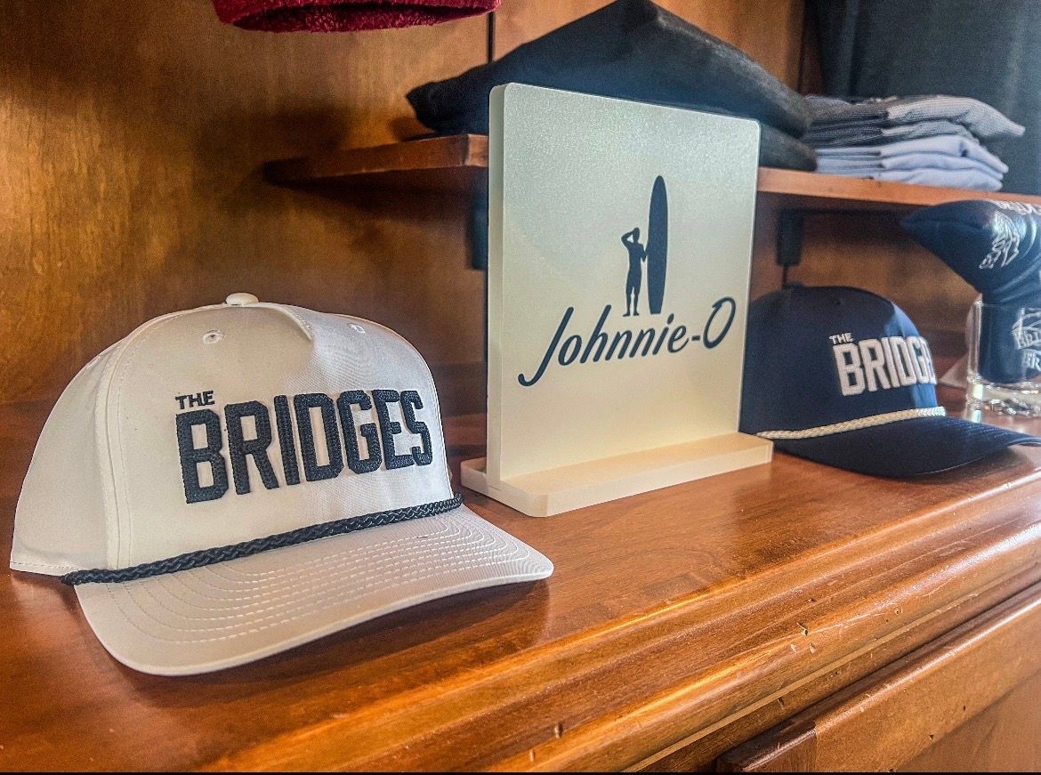 White and navy baseball caps with